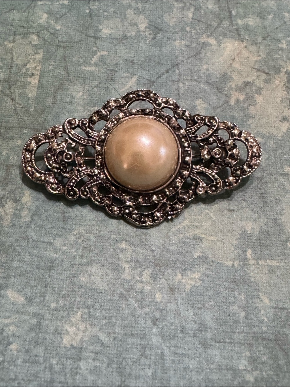 FILGREE AND FAUX PEARL BROOCH